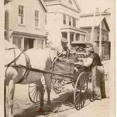 Water Street with horse drawn tean, Stonington CT
