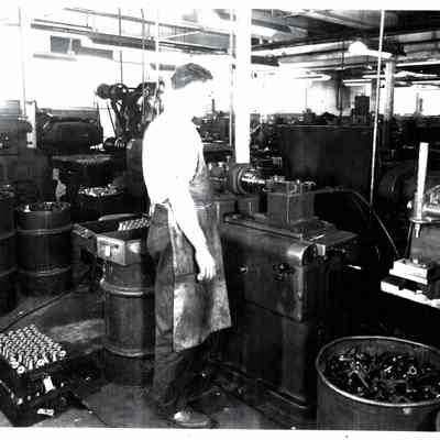 Worker inside Atwood Machine Co.