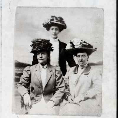 Three women with hats