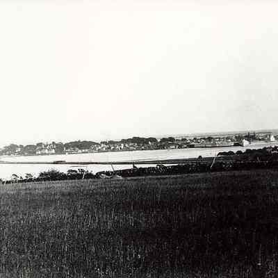 Railroad bridge across Stonington harbor. Stonington borough in background with steamer at dock, Stonington CT