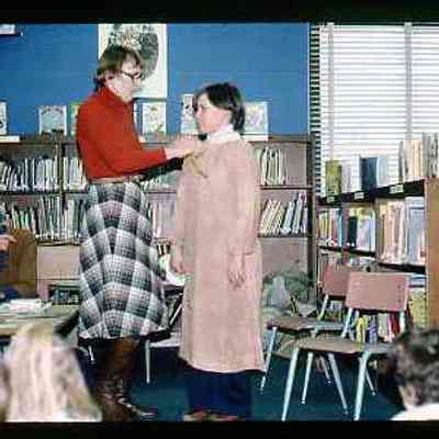 Dressing student in colonial dress
