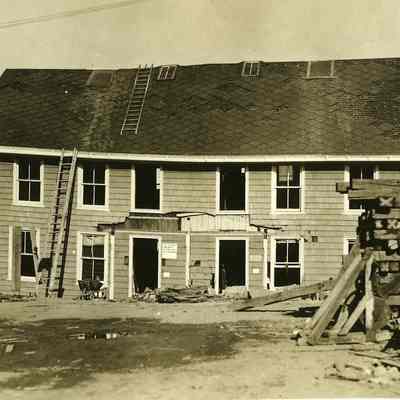 Damaged two story house