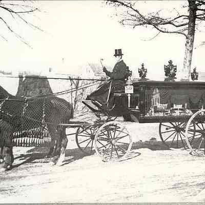 Horse drawn hearse outside Robinson burial ground, Broad Street, borough, Stonington CT