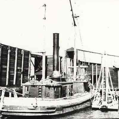 tug and small fishing boat at dock, Stonington CT