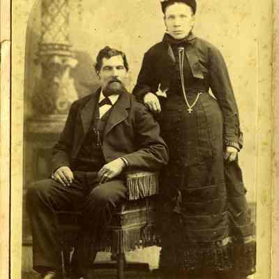 Unknown older(?) couple, she has cross on chain