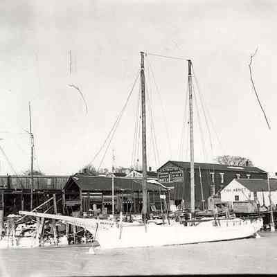 Sloop "Gazelle" at Pendleton's dock with fish market, Stonington CT