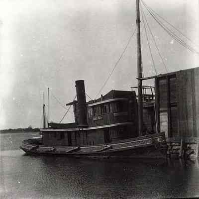 Tender/tug tied up at dock (name on boat undistinguishable), Stonington CT
