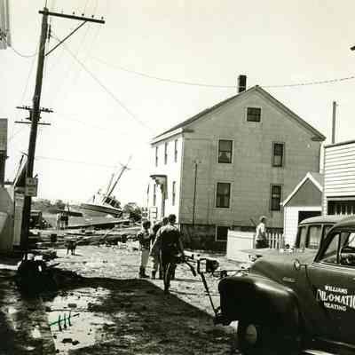 People looking at damage