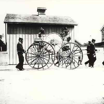 Steamer Co. rig being pulled by firemen, Stonington CT