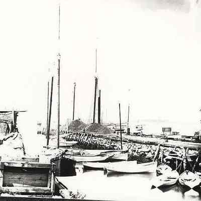 Boats tied up at wharf/breakwater, Stonington CT