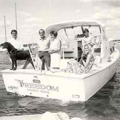 Tommy and Lynn Miller (and family: Lloyd, Bruce, Lindsay and dogs) on board "Freedom" in late 1950s, Stonington CT