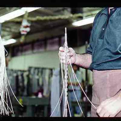 Braiding strands on mandrel