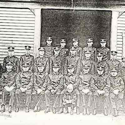 Company photo of firemen and young child , Stonington CT