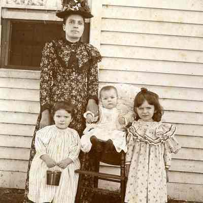 Unknown woman and young family