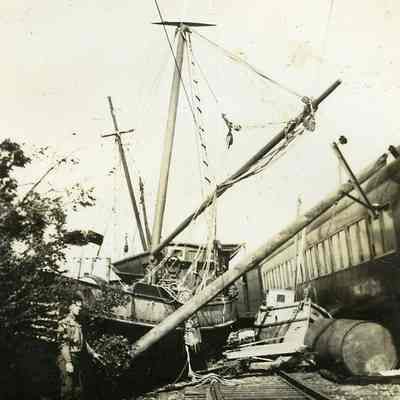 Derailed train and fishing boats