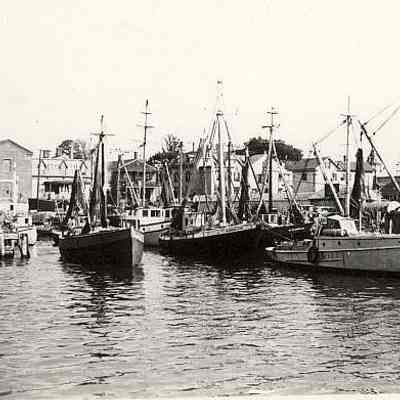 Fishing boats tied up at docks, Stonington CT