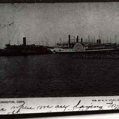 Dark photo of postcard of steamers at dock in Stonington CT