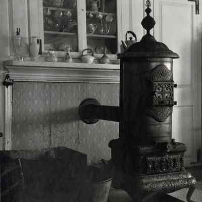 Covered fireplace and stove in Stanton Davis Homestead