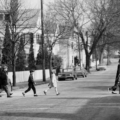 Marilyn Riley crossing Main St.