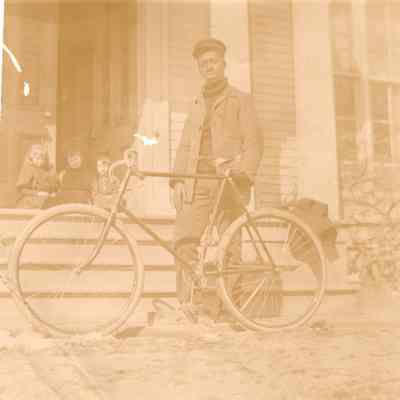 Bicycle and children at Pine Point