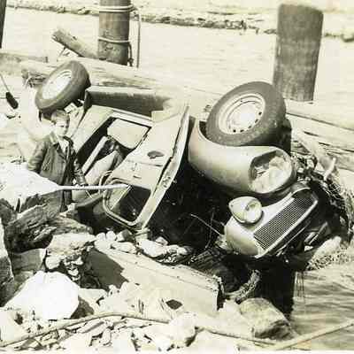 Overturned automobile and debris