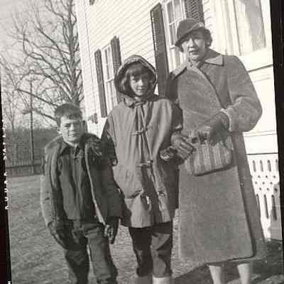 Mother and two children outside home, Stonington CT