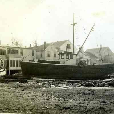 Fishing boats washed on shore
