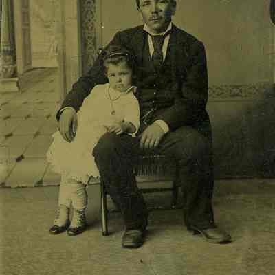 Unknown man with young child