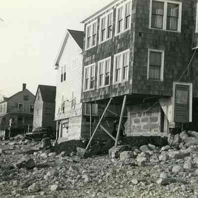 Damaged houses missing foundations