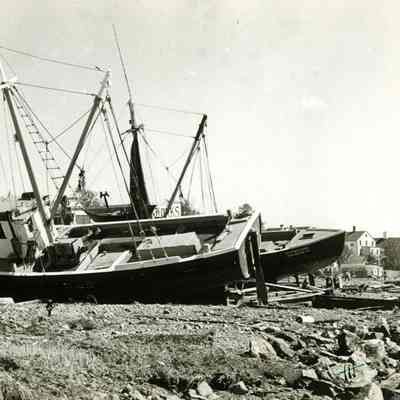 Fishing boats washed on shore