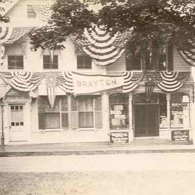 Brayton's Pharmacy decorated for Stonington Celebration, corner of High and Main Streets, Stonington CT