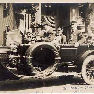 People in car during 1914 Parade at corner of Main and Church Streets, Stonington CT