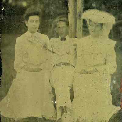 Unidentified man and two women