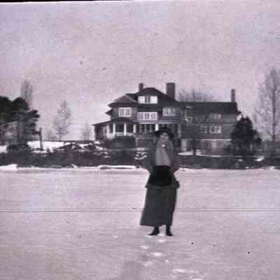Woman on frozen Quanaduck Cove