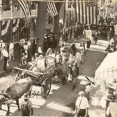 Oxen cart with early settlers, Water Street, Stonington CT