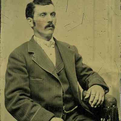Unknown man with mustache and dark hair