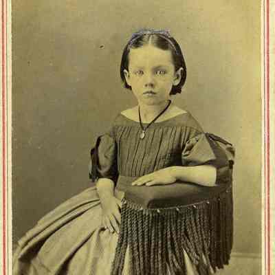 Unidentified young girl with blue hair ribbon