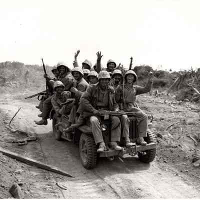 U.S. Marines on jeep