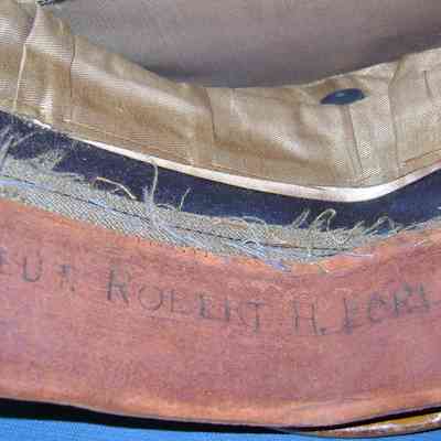 Satin lining, Leather Sweatband. Inside is a paper crown disc previously taped in.