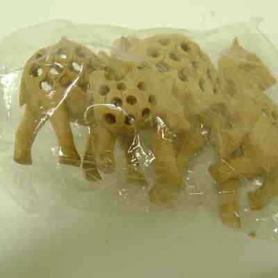 Bag of Carved Wooden Camels