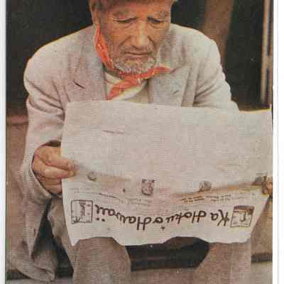 Native Hawaiian Man Reading Newspaper