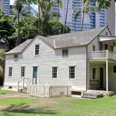 For reference only: The Frame House (Ka Hale La‘au), erected in Hawaii in 1821, is the oldest wood frame structure still standing in the Hawaiian Islands. It was shipped around Cape Horn from Boston, MA in 1820. The house was used as a communal home by many missionary families who shared it with island visitors and boarders. | Courtesy of Hawaiian Mission Houses Historic Site and Archives