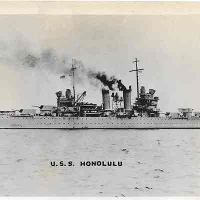 Author's Personal Collection: On December 7, 1941, Honolulu was moored in the Navy Yard when the Imperial Japanese Navy attacked Pearl Harbor. Honolulu suffered only minor hull damage from a near miss from a bomb that exploded under the water.