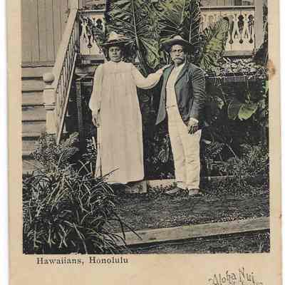 Hawaiian Couple in Front of Their Home