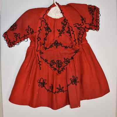 child's dress and apron