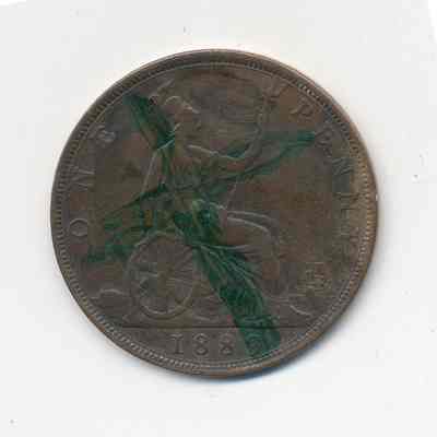 2023.63.2: Detail of reverse, showing Britannia holding a trident, the date and value of the penny, and a green, painted cross.