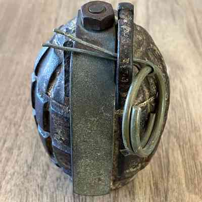 2023.260: Rear view showing replacement lever and bolt, missing pin arm and original pin