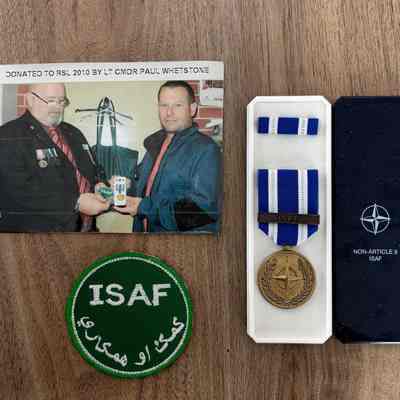 2023.7.5: Photograph, ISAF shoulder patch, and boxed NATO Medal with ISAF bar, and ribbon bar