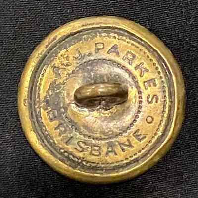 2023.1.13.2r: Reverse of medium brass button