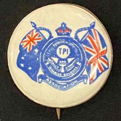 Totally and Permanently Injured Disabled Soldiers Association circular pin, white, blue & red colours, Australian & British flags, King's Crown